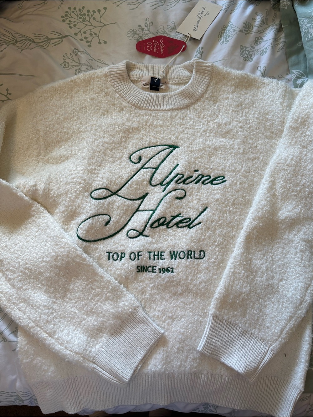 Universal Thread White Crewneck Sweater with Green Alpine Hotel Script